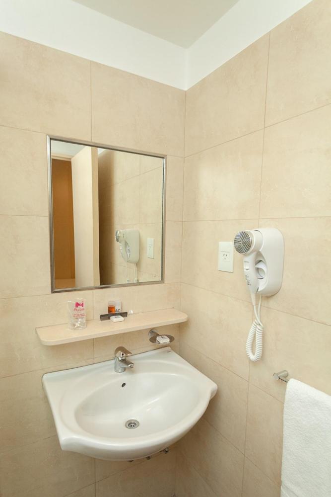 Hotel Austral Express Comodoro Rivadavia Habitación foto